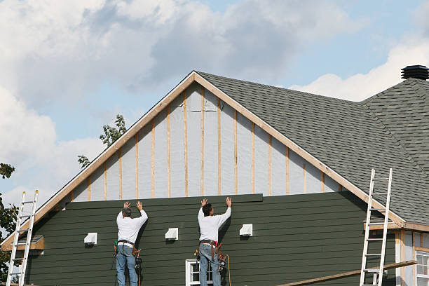 Professional Vinyl Siding technician working in Laughlintown, PA